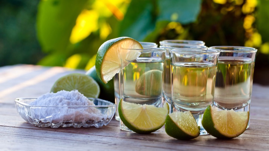 A tequila tasting, mid-pour